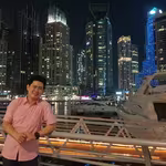 Michael Dovinno in front of city