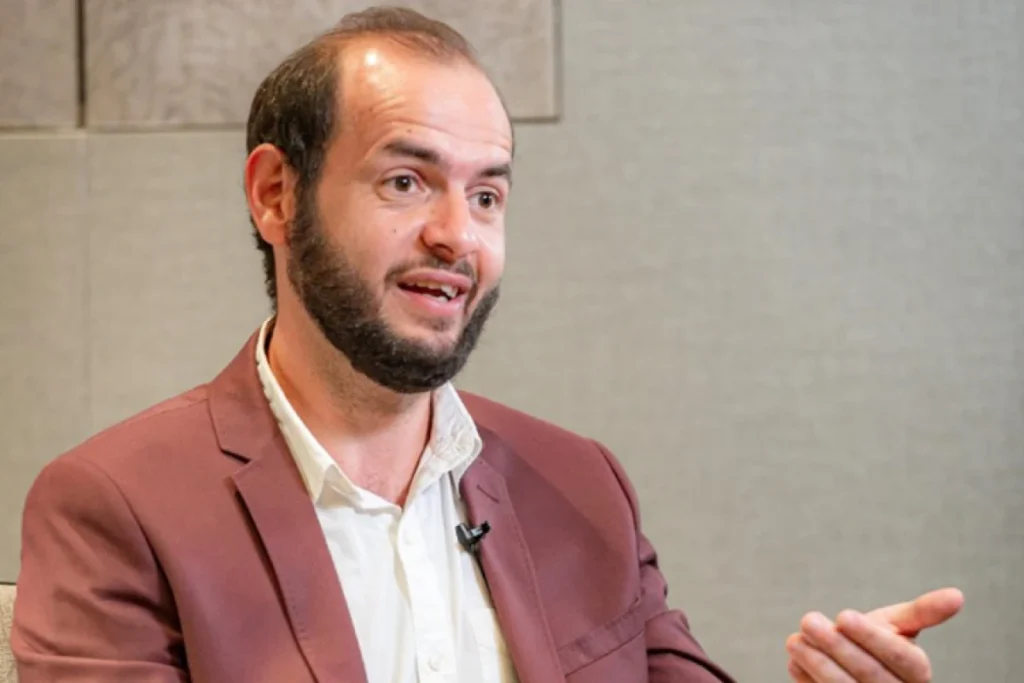 Global Entrepreneurship Month: Qnet Success Stories To Inspire 6 Omar Medhat talking in an interview