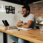Direct Selling Industry Beginner looking at his devices