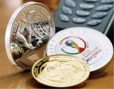 Unforgettable Defining Moments In Qnet History 8 QNET collecting coins for FIFA World Cup 2002