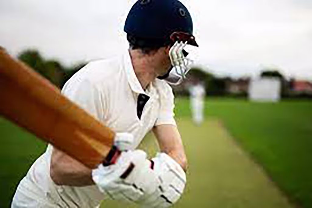 Go For 6! What Entrepreneurs Can Learn From The T20 World Cup 3 Man winding up to swing cricket bat during cricket game