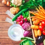 Spread of QNET products with various colourful vegetables show our many options for a vegetarian lifestyle