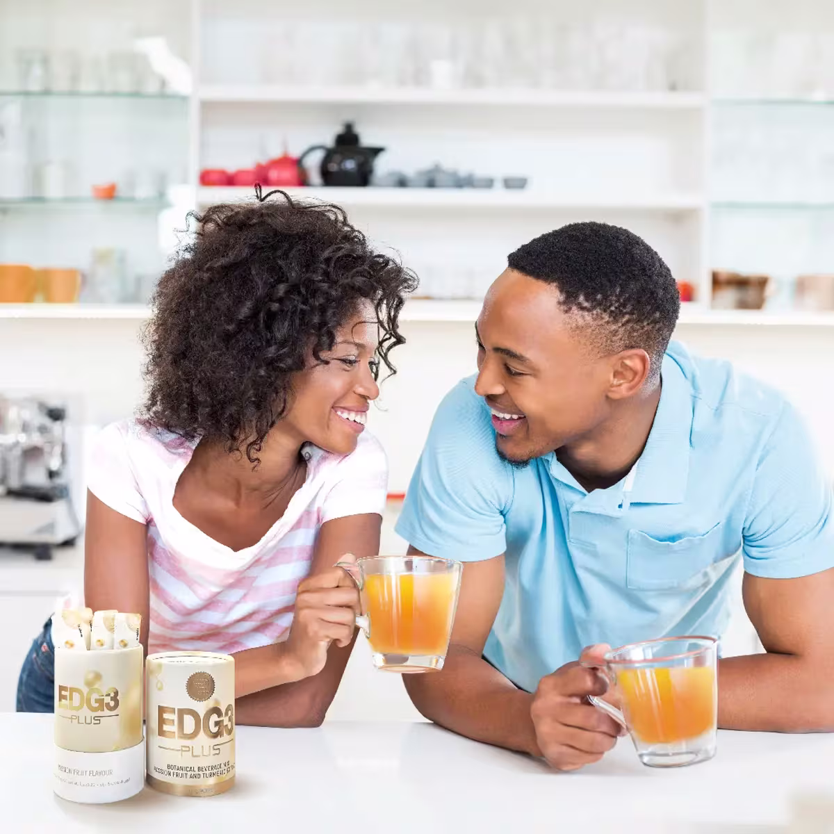 Summer Skincare Tips For Healthy, Glowing Skin 7 Couple enjoying Edg3 in kitchen looking at eachother