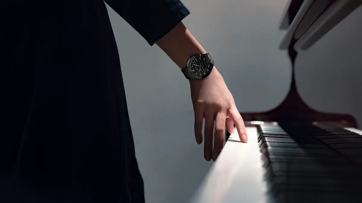 Here Are All The Reasons Why People Join Qnet 4 Woman's hand on the piano; there is a Bernhard H. Mayer Alto Ceramic watch on her wrist