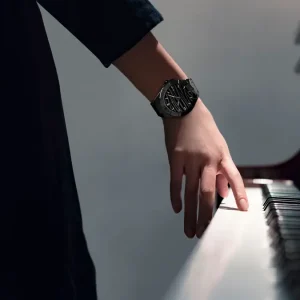 Watches &Amp; Jewellery 12 Woman's hand on the piano; there is a Bernhard H. Mayer Alto Ceramic watch on her wrist